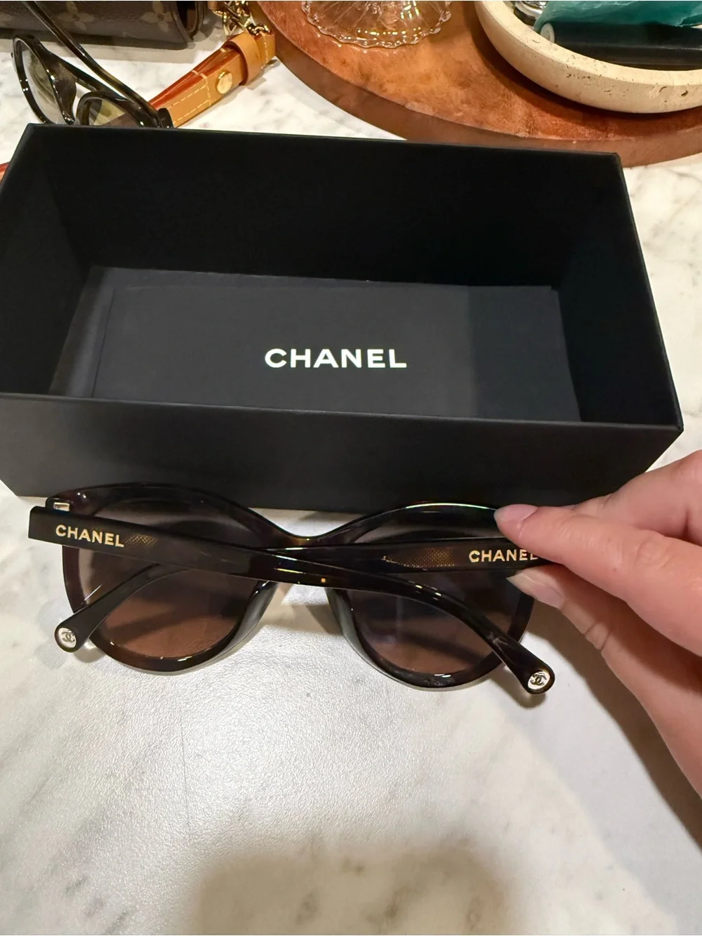 CHANEL Tortoiseshell Round Sunglasses with Gold Logo